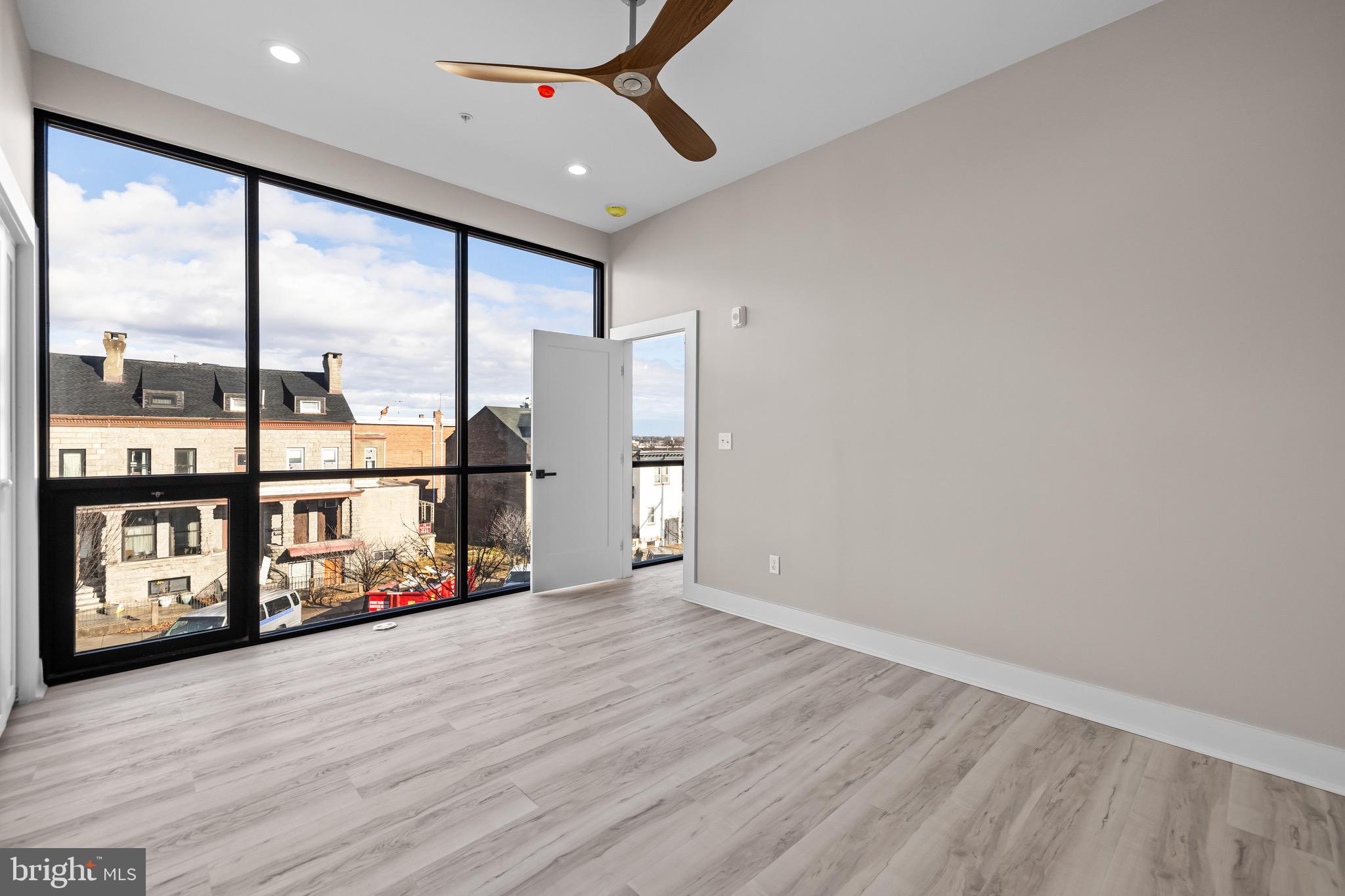 400 South Conkling Street, Unit 4 Baltimore, MD 21224 - Photo 12 of 18 a view of an entryway with wooden floor