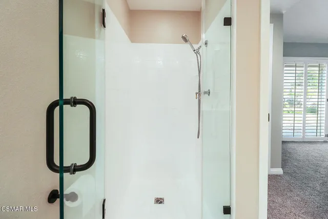 a bathroom with a mirror