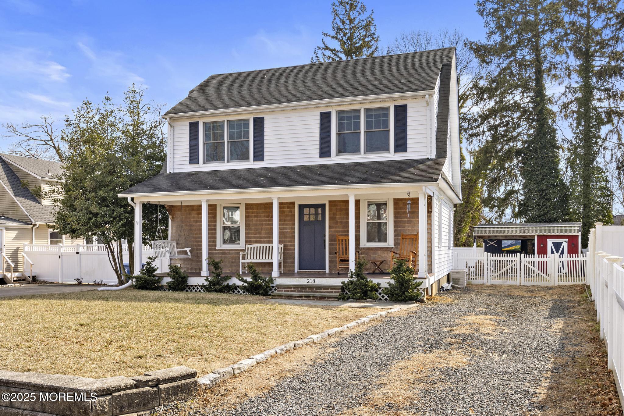 218 Cooper Road Red Bank, NJ 07701 - Photo 1 of 43 a front view of a house with a yard