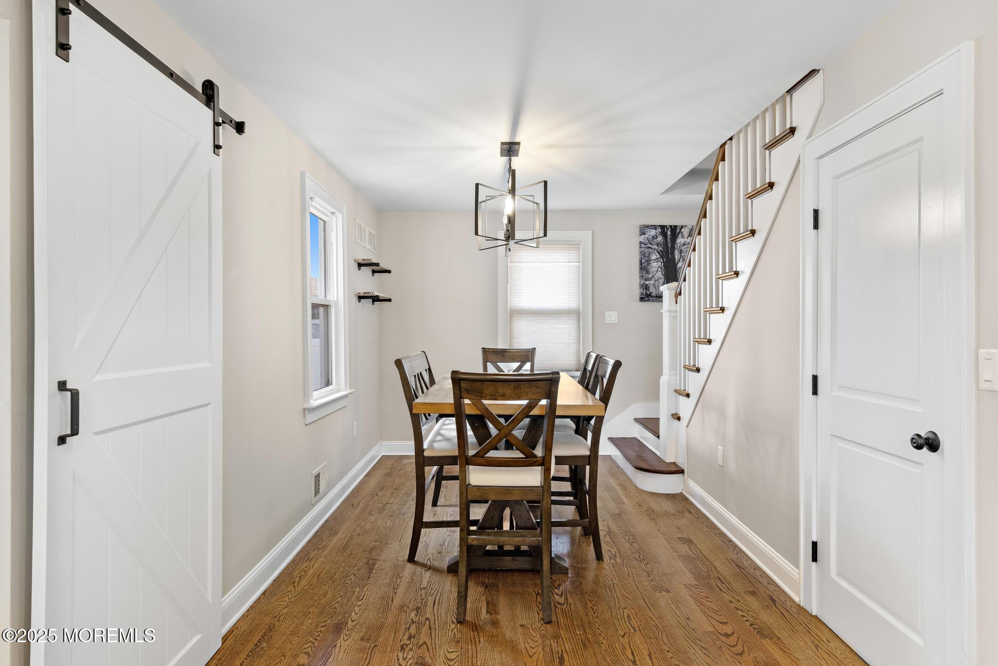 218 Cooper Road Red Bank, NJ 07701 - Photo 11 of 43 a view of a dining room with furniture and wooden floor