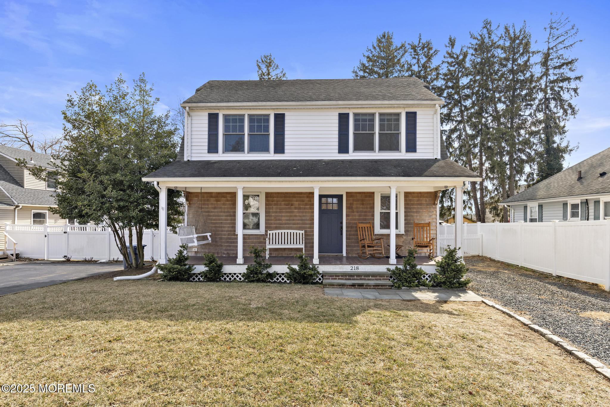 218 Cooper Road Red Bank, NJ 07701 - Photo 2 of 43 a front view of a house with a yard