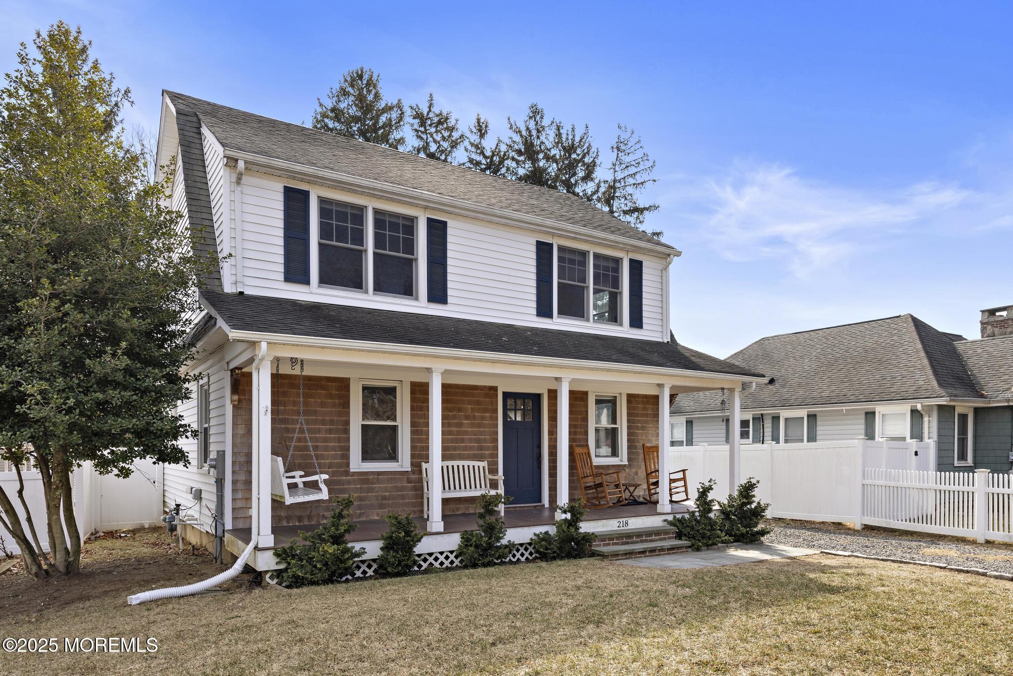 218 Cooper Road Red Bank, NJ 07701 - Photo 3 of 43 front view of a house with a yard