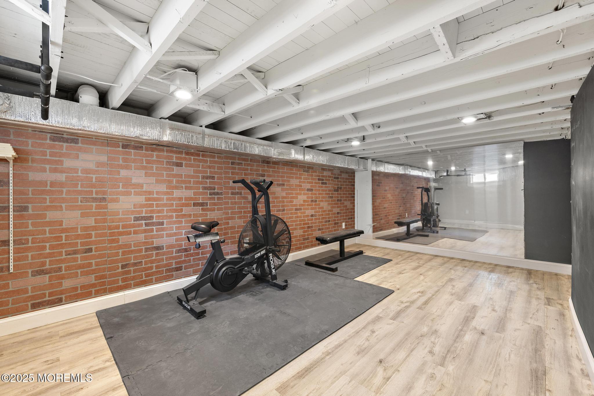 218 Cooper Road Red Bank, NJ 07701 - Photo 32 of 43 a view of a room with gym equipment