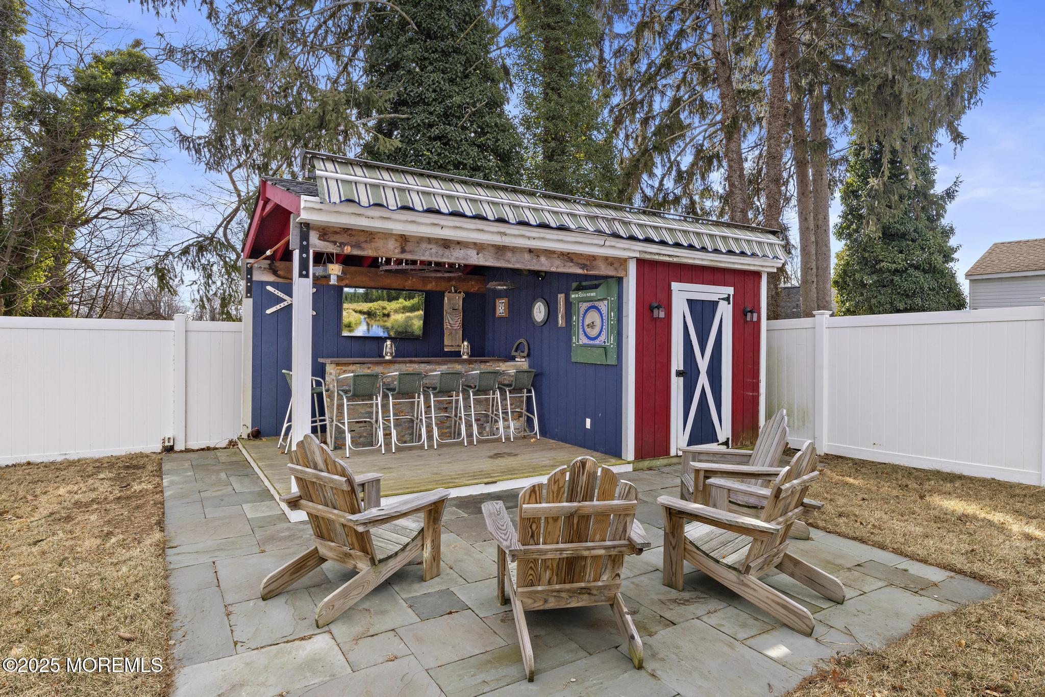 218 Cooper Road Red Bank, NJ 07701 - Photo 33 of 43 a view of a chairs and tables in patio