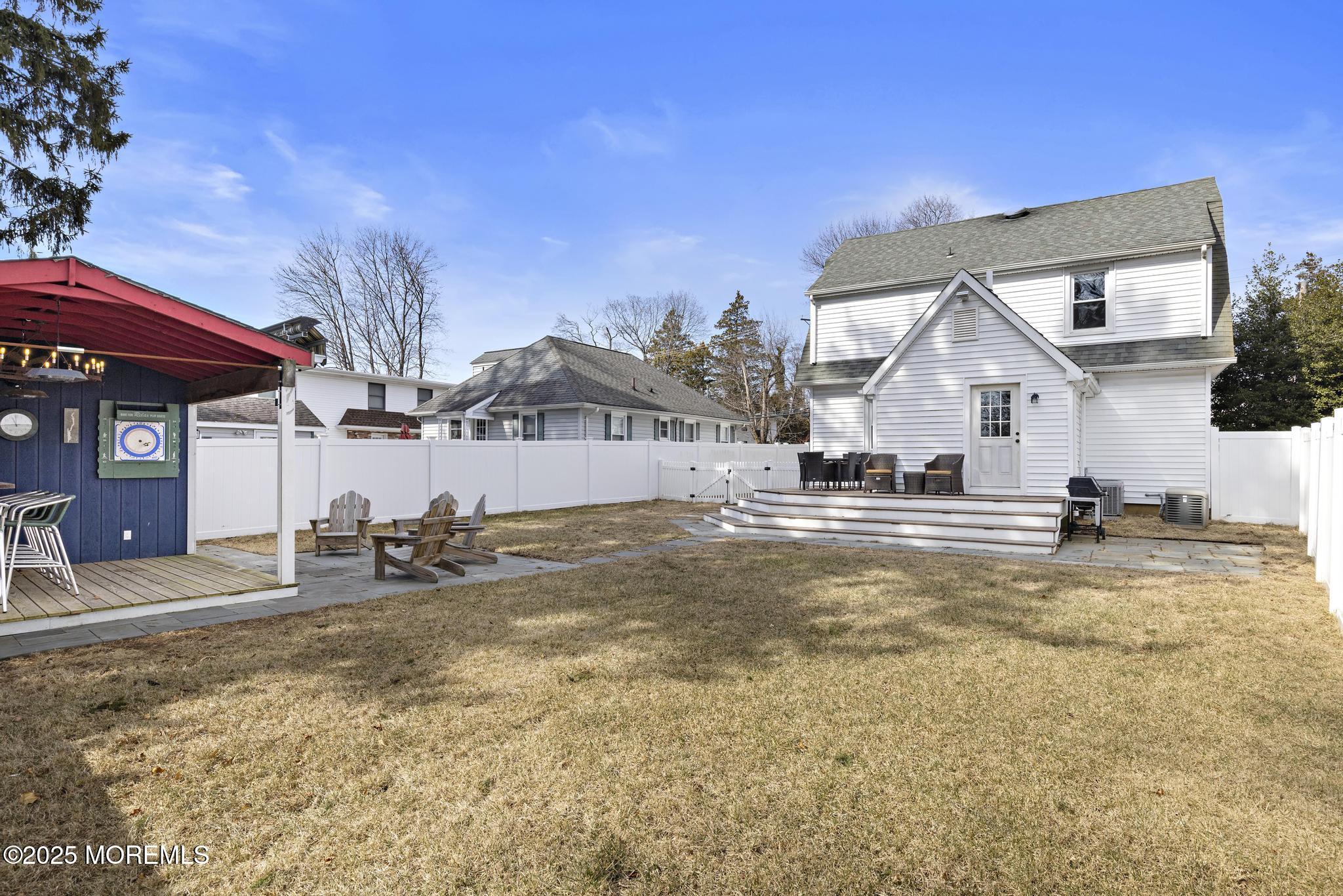 218 Cooper Road Red Bank, NJ 07701 - Photo 36 of 43 a view of a house with a patio