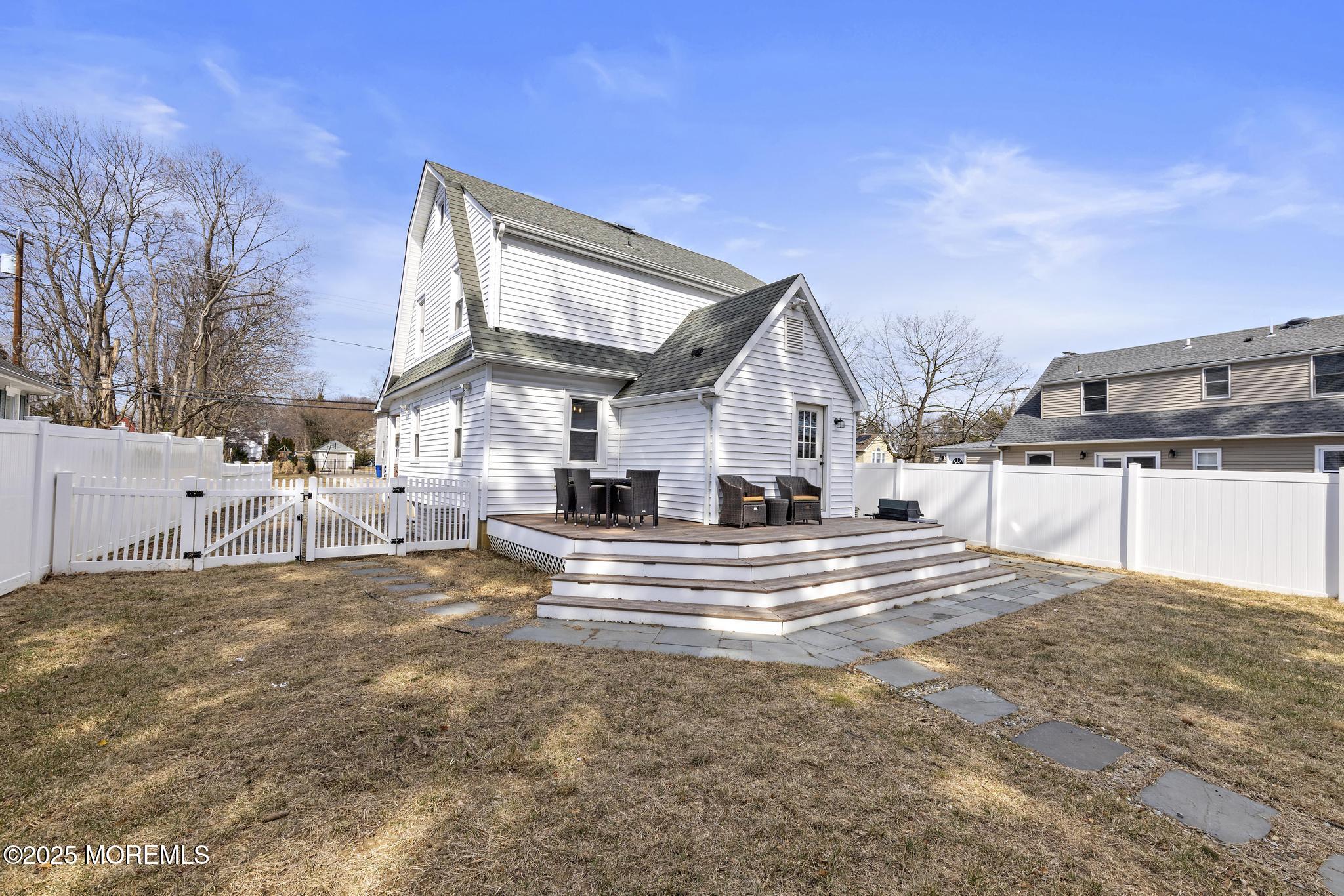 218 Cooper Road Red Bank, NJ 07701 - Photo 38 of 43 a view of a house with a sink and yard