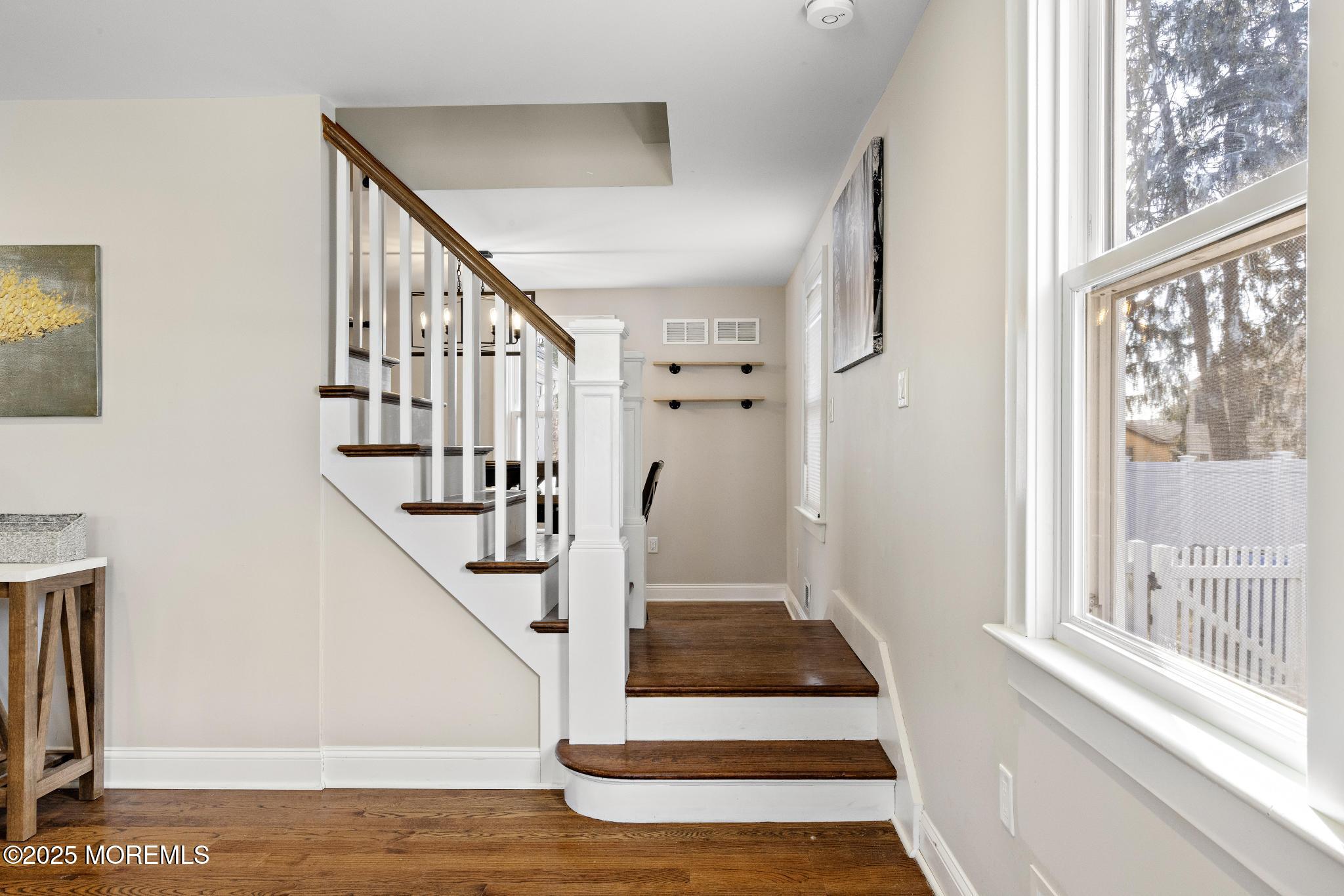 218 Cooper Road Red Bank, NJ 07701 - Photo 9 of 43 a view of entryway and hall with wooden floor