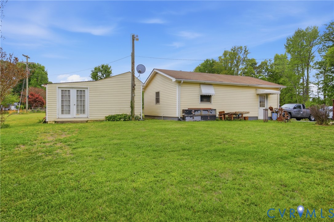 3590 Belle Meade Road Bumpass, VA 23024 - Photo 17 of 20 a front view of house with yard and green space