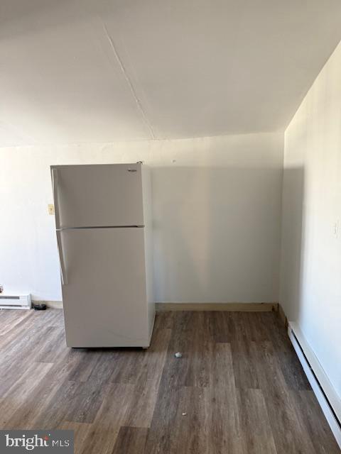 103 Cumberland Street, Unit 2 Clear Spring, MD 21722 - Photo 6 of 8 a view of a room with wooden floor and a refrigerator