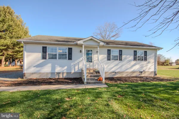 a view of a house with a big yard