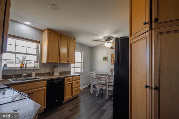 a kitchen with a sink cabinets and counter space