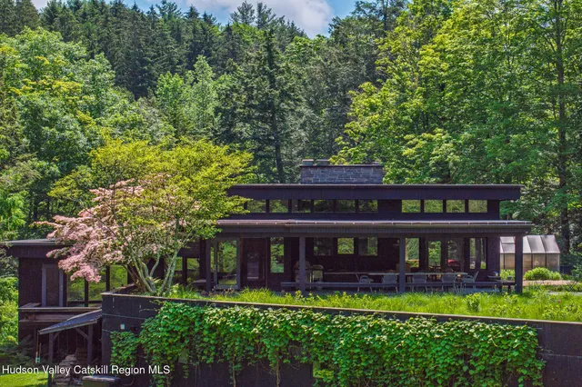 a backyard of a house with lots of green space
