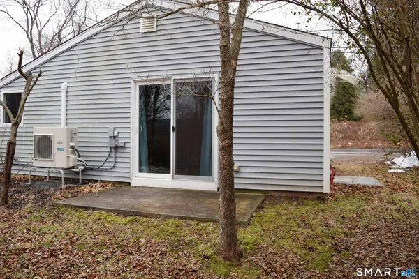 a view of house with trees in the background