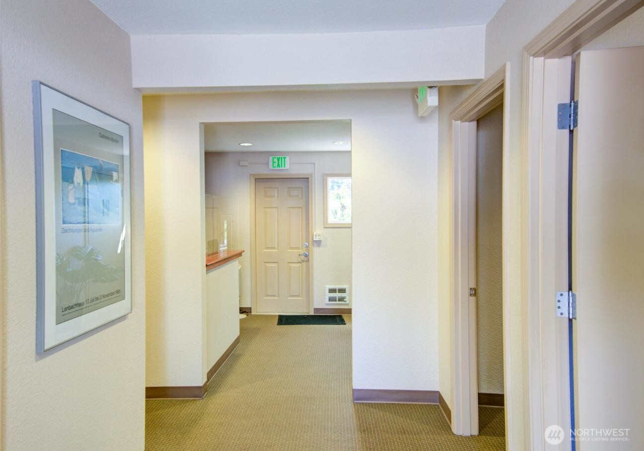 7522 221st Place Southwest Edmonds, WA 98026 - Photo 2 of 16 a view of a bathroom with a glass door