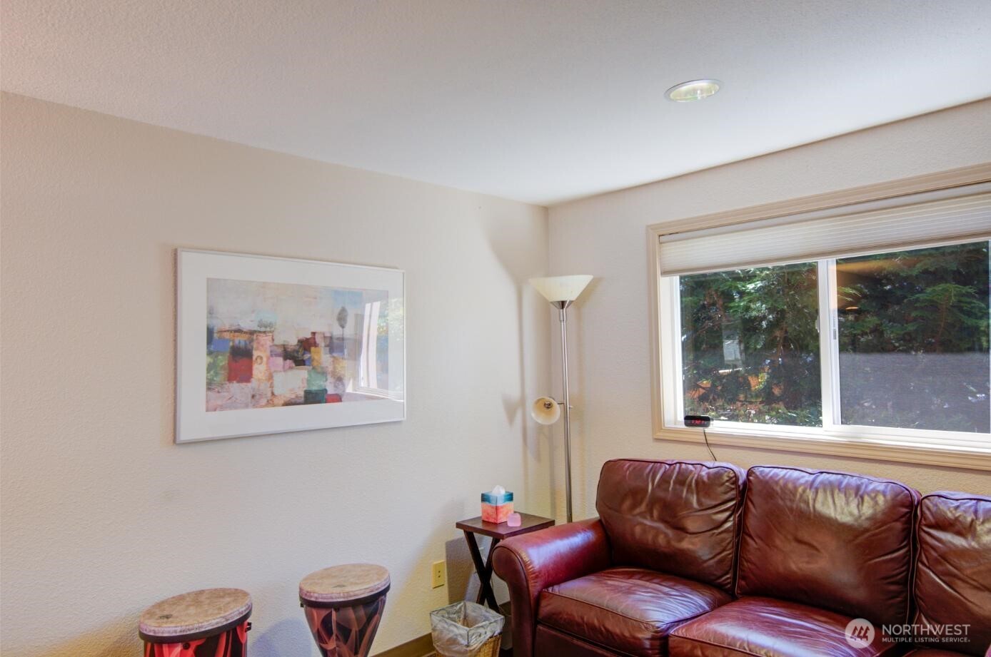 7522 221st Place Southwest Edmonds, WA 98026 - Photo 10 of 16 a living room with furniture and a large window