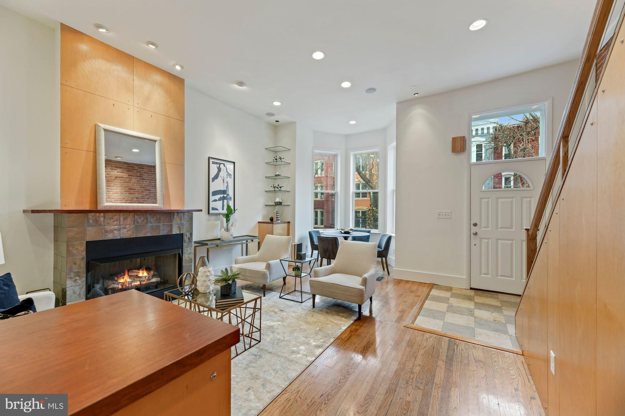 1313 Riggs Street Northwest Washington, DC 20009 - Photo 3 of 35 Main Level Living/Dining Room with Fireplace