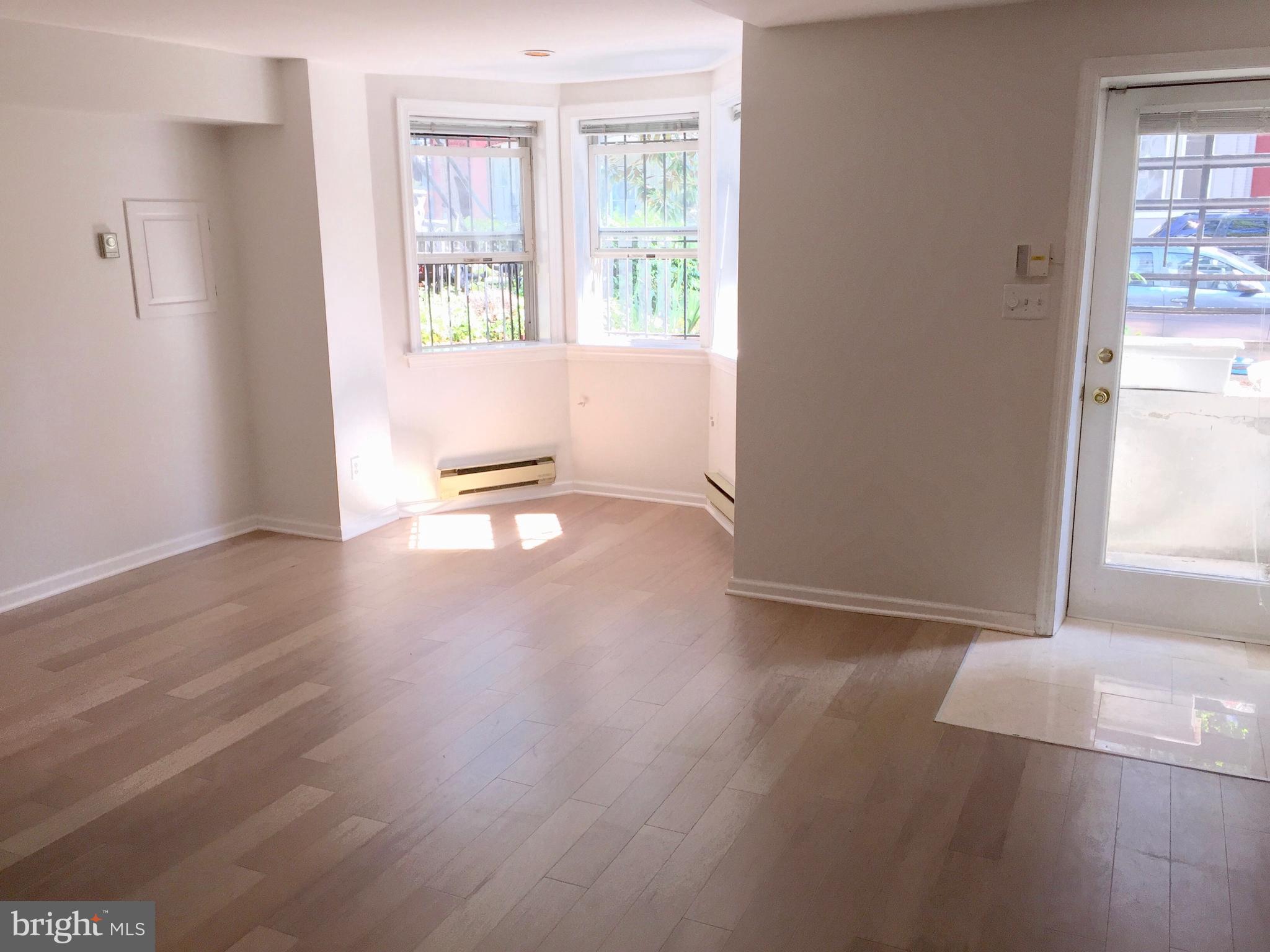 1313 Riggs Street Northwest Washington, DC 20009 - Photo 26 of 35 Terrace Level Living/Dining Rm (2016 Post Renov)