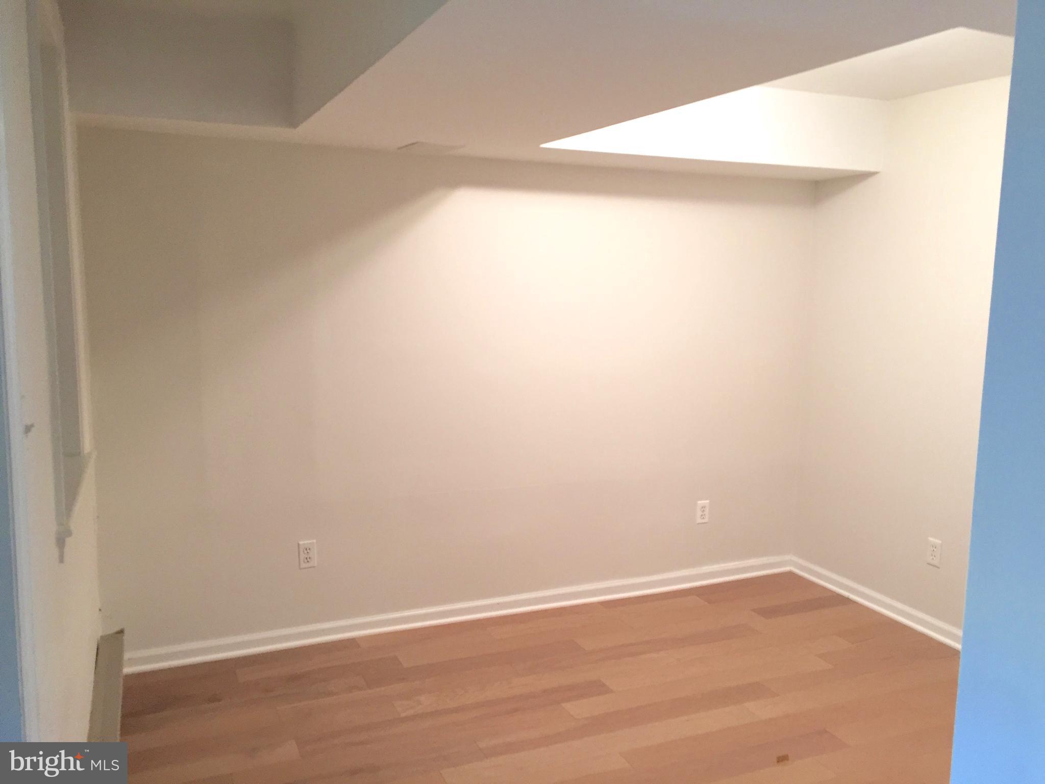 1313 Riggs Street Northwest Washington, DC 20009 - Photo 29 of 35 Terrace Level Bedroom (2016 Post Renov)