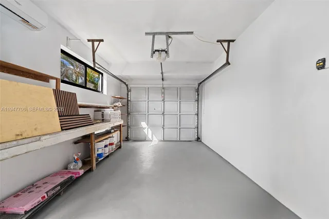 an aerial view of house with yard