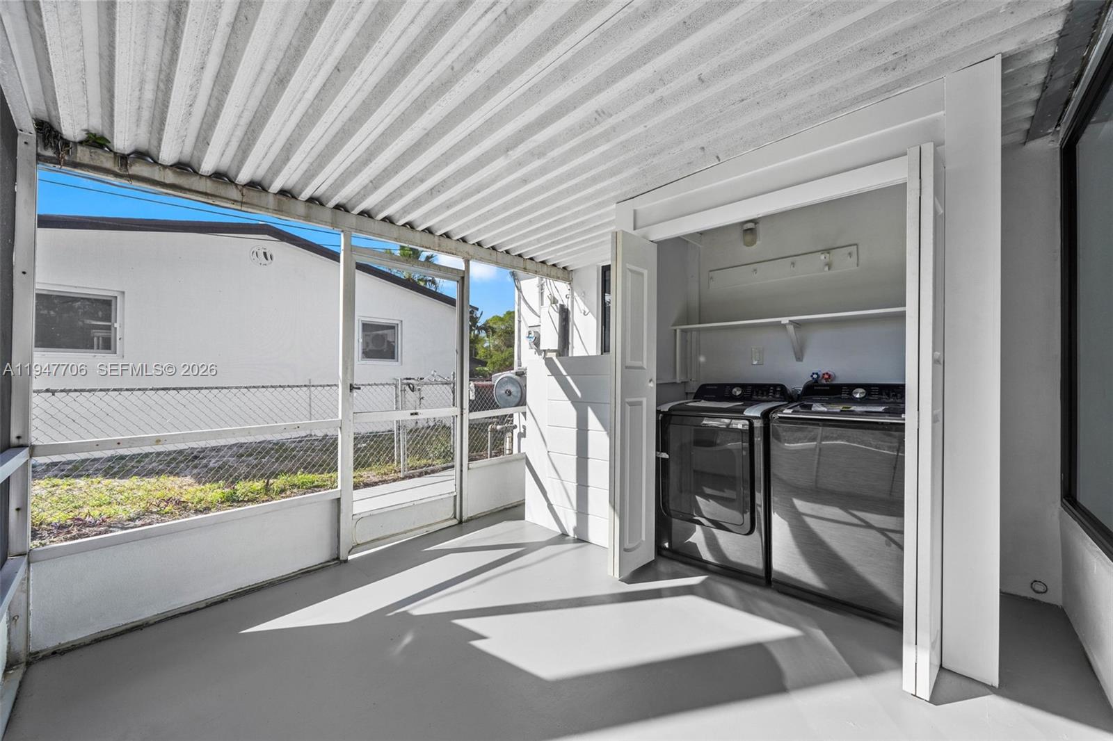 709 Southwest 4th Court Hallandale Beach, FL 33009 - Photo 33 of 59 a view of an empty room and a window