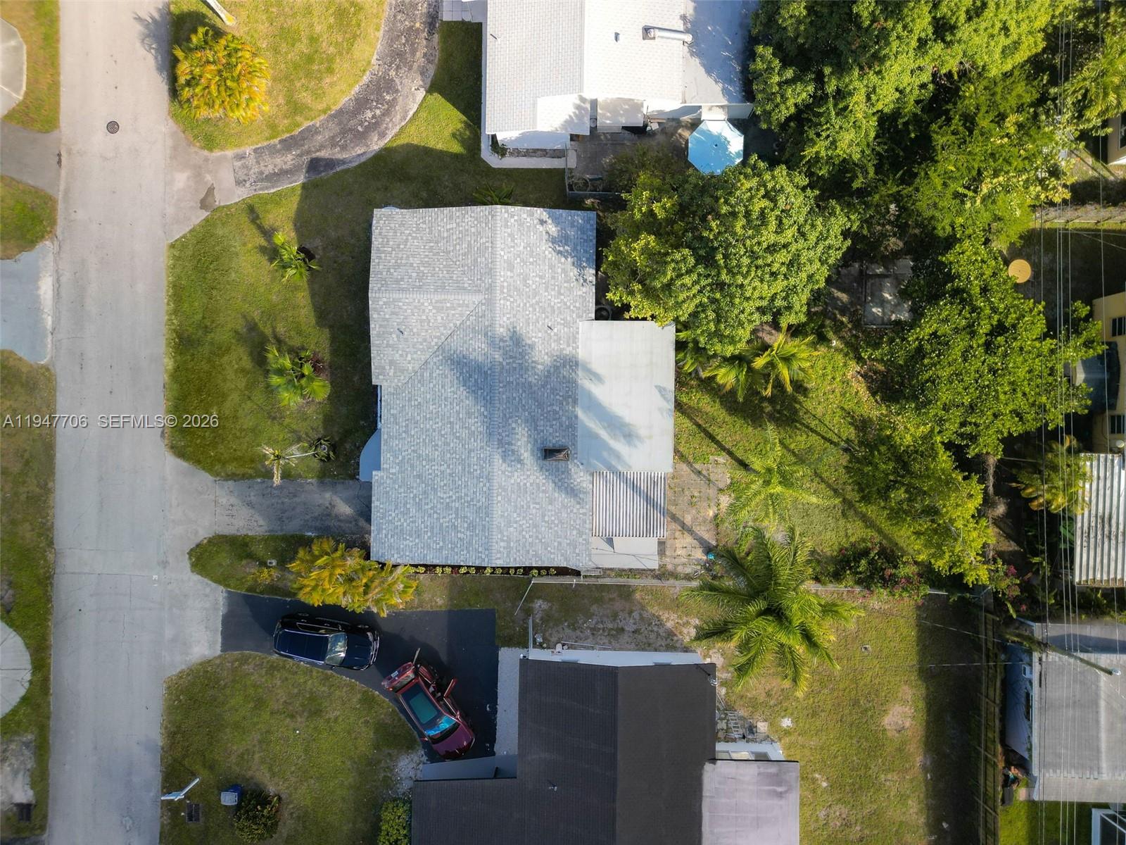 709 Southwest 4th Court Hallandale Beach, FL 33009 - Photo 40 of 59 an aerial view of a house with swimming pool