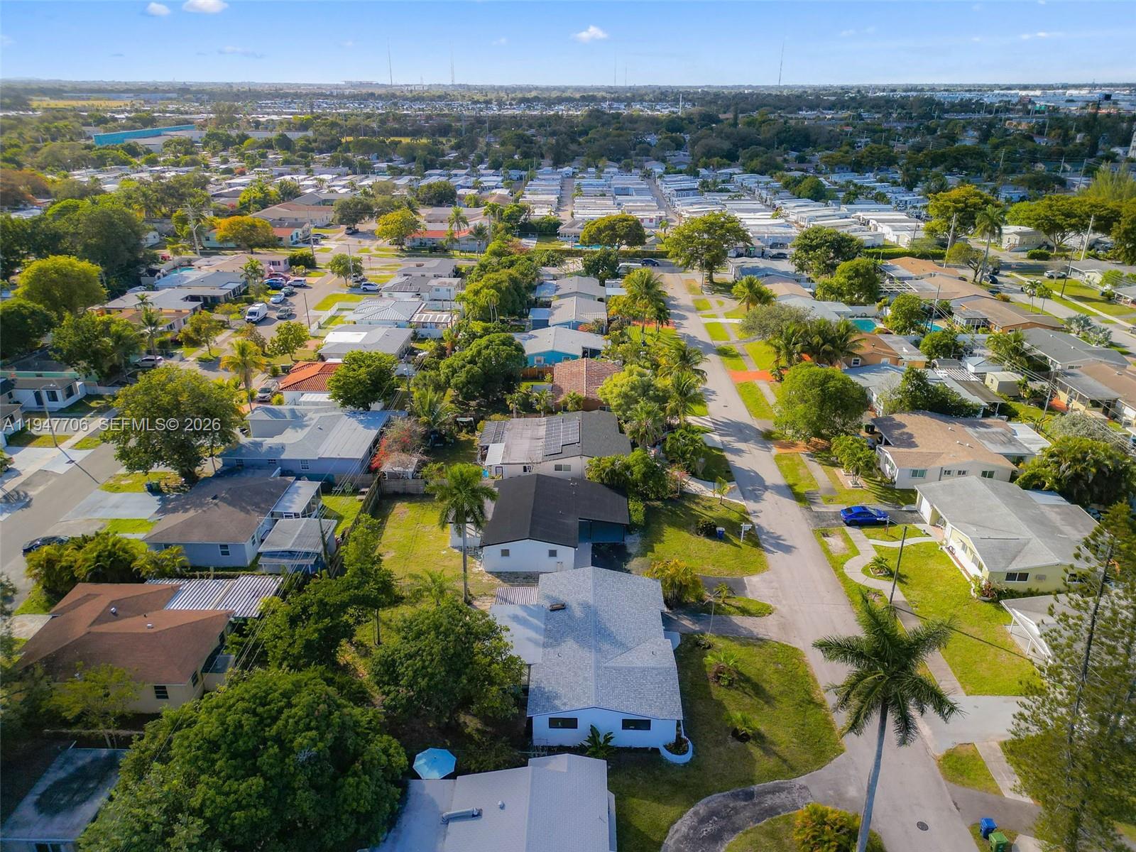 709 Southwest 4th Court Hallandale Beach, FL 33009 - Photo 48 of 59 an aerial view of residential houses with outdoor space