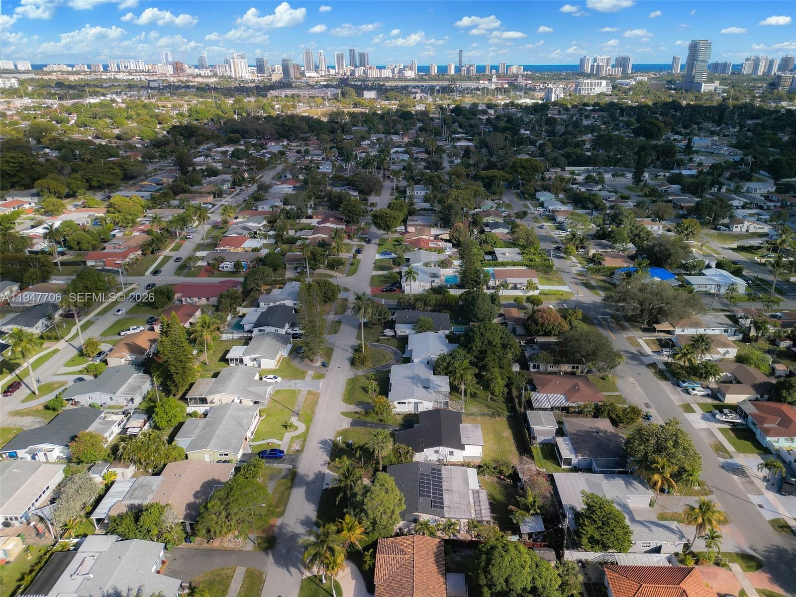 709 Southwest 4th Court Hallandale Beach, FL 33009 - Photo 51 of 59 an aerial view of a city with lots of residential buildings