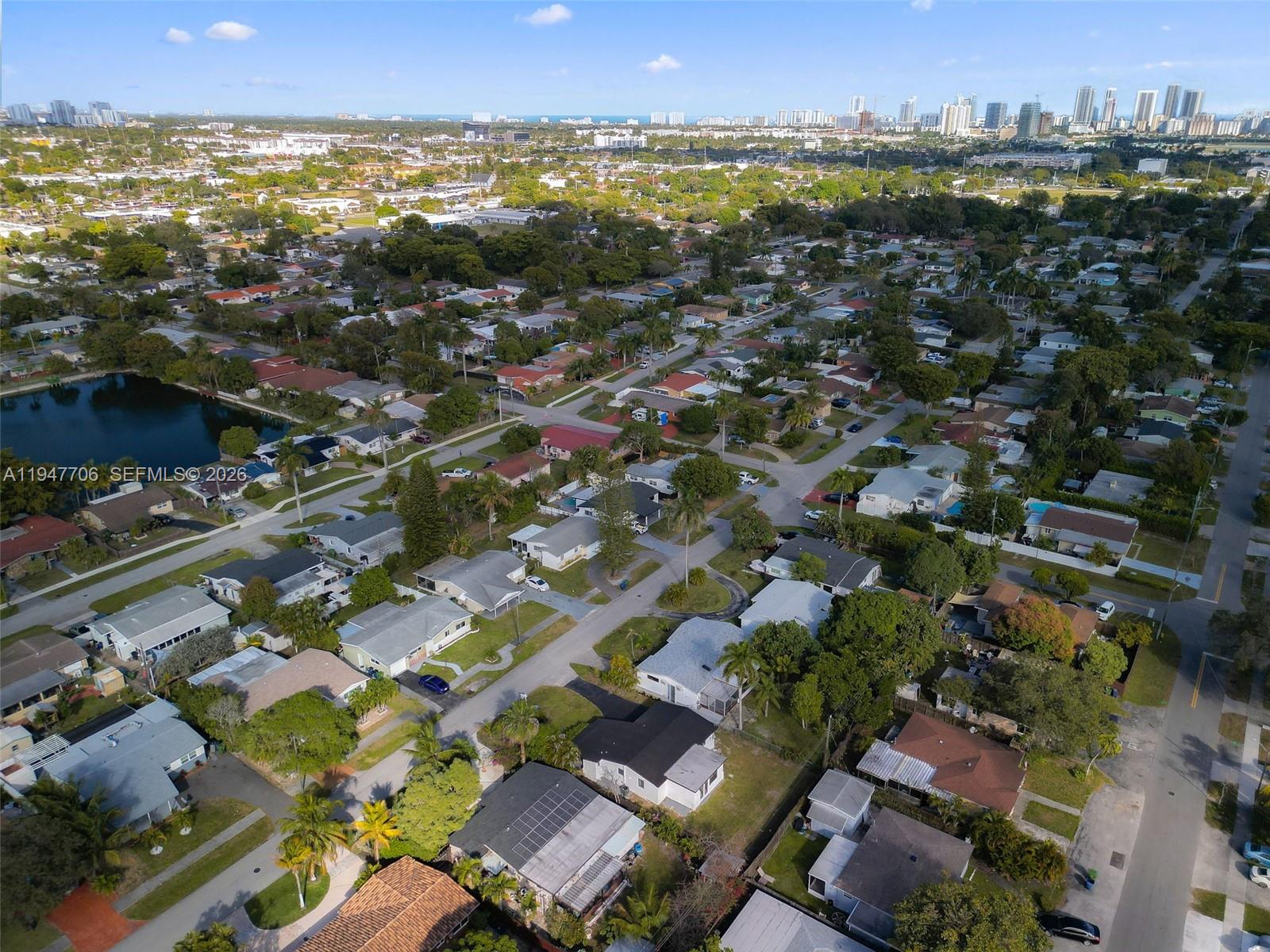 709 Southwest 4th Court Hallandale Beach, FL 33009 - Photo 52 of 59 an aerial view of residential houses with outdoor space