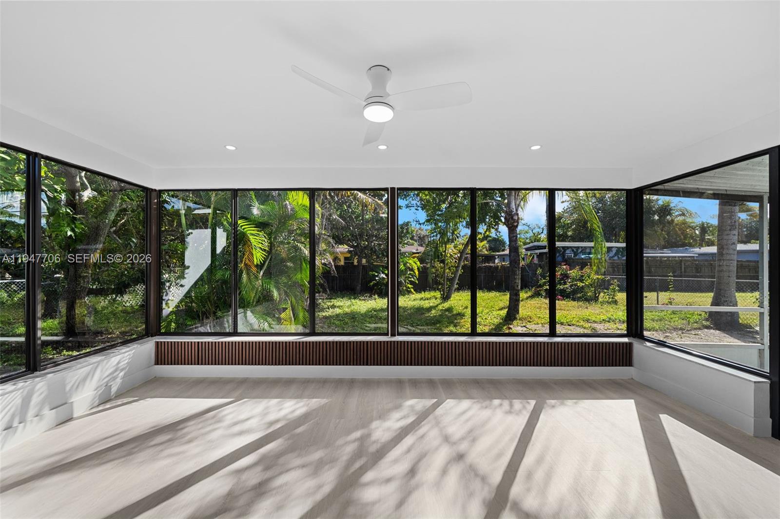 709 Southwest 4th Court Hallandale Beach, FL 33009 - Photo 9 of 59 a view of a floor to ceiling window in a room