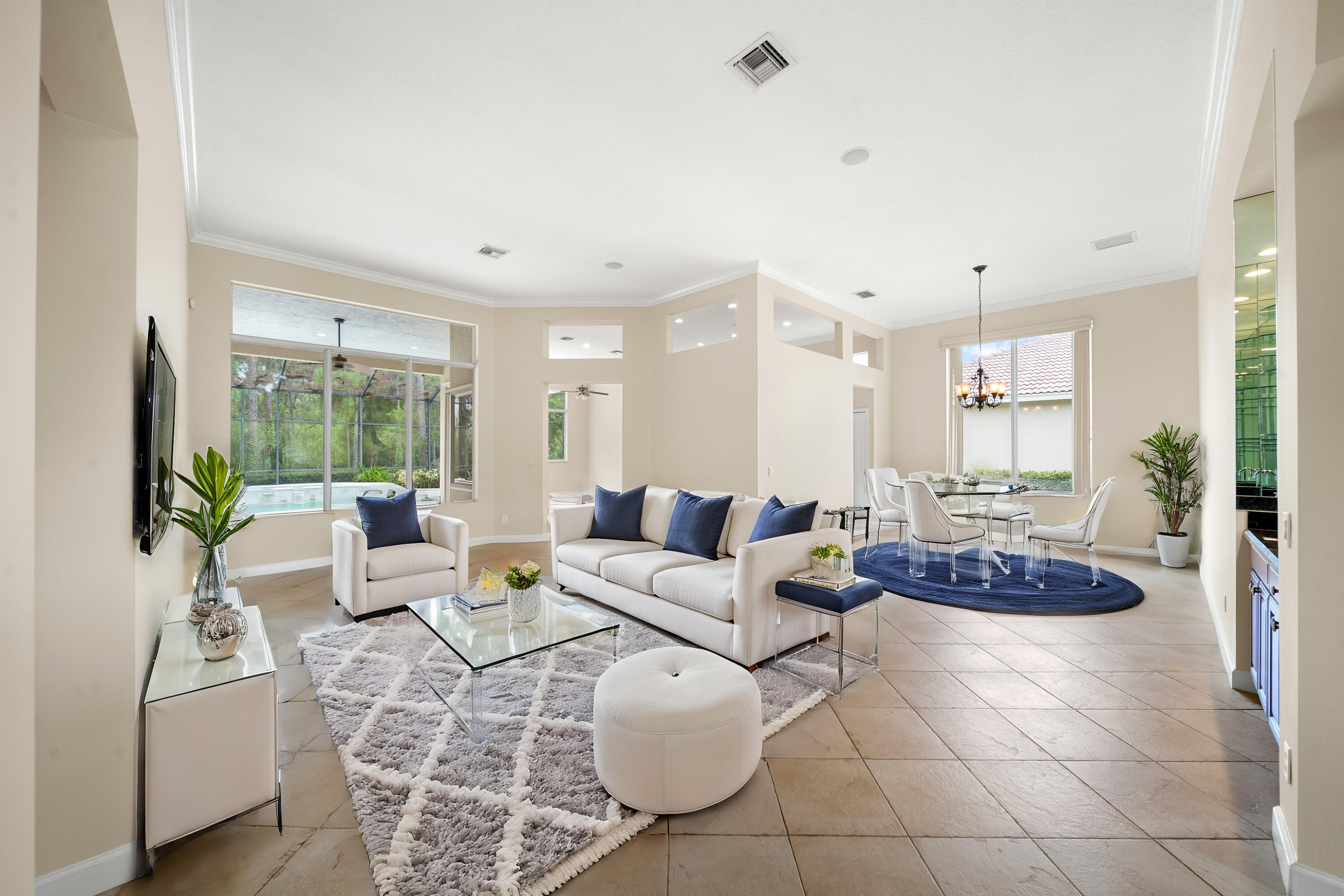 9004 Pumpkin Ridge Port St. Lucie, FL 34986 - Photo 14 of 36 a living room with furniture and a large window