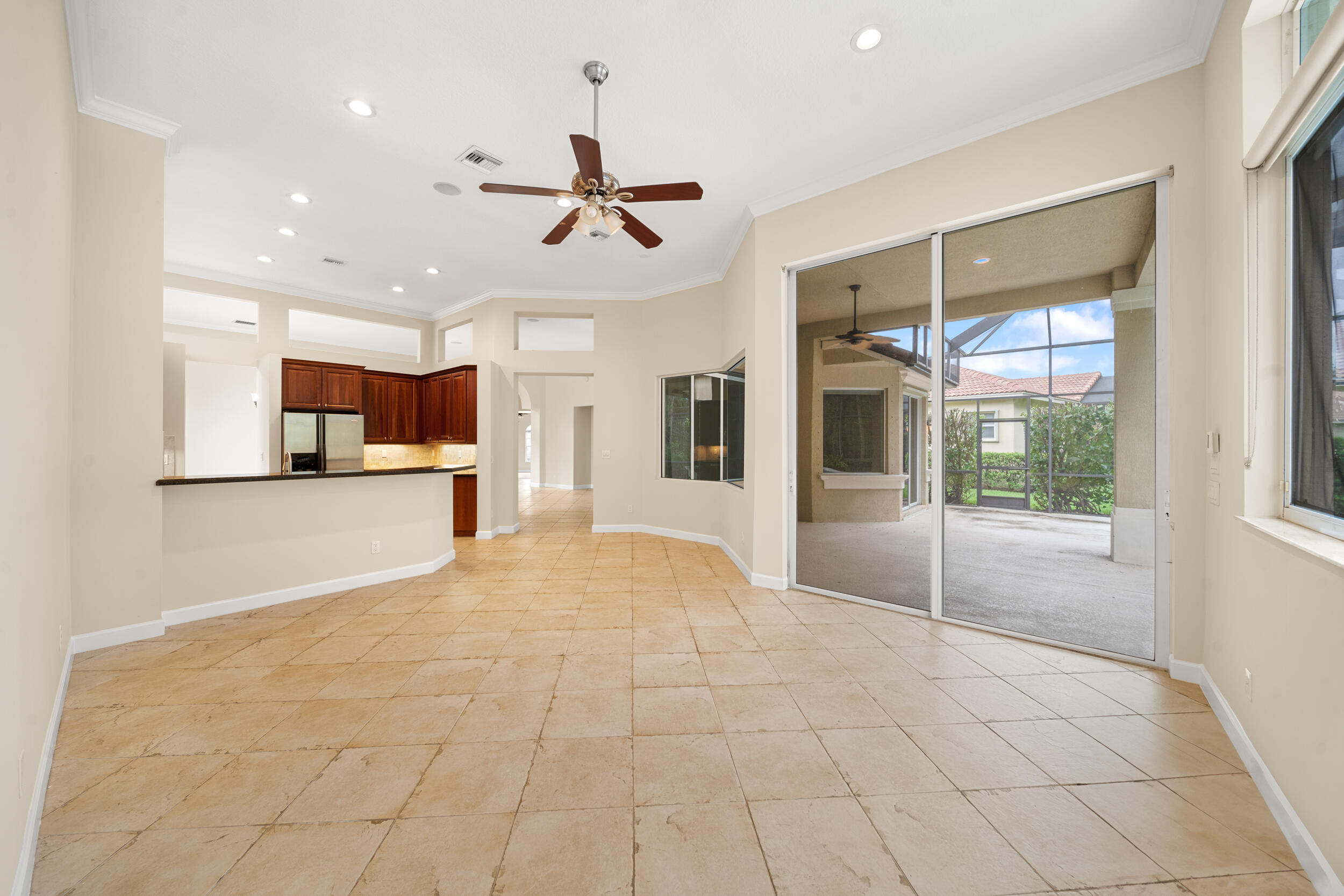 9004 Pumpkin Ridge Port St. Lucie, FL 34986 - Photo 27 of 36 a view of a kitchen with a sink and a window