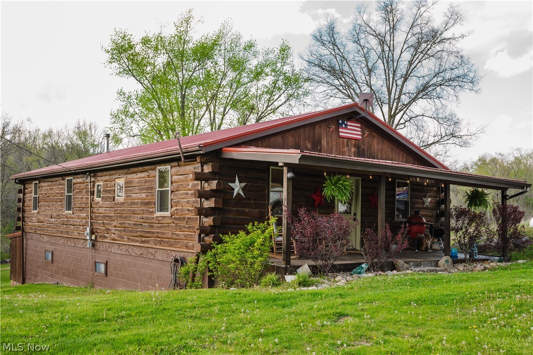 47480 Unionvale Road Cadiz, OH 43907 - Photo 2 of 37 Exterior view of residence featuring a welcoming front porch
