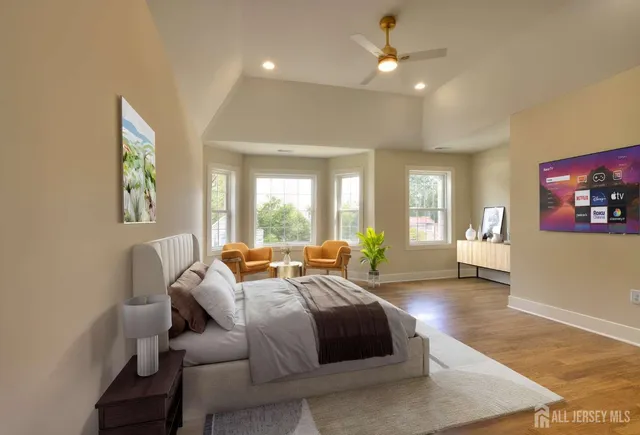 a bed room with a bed and a chandelier