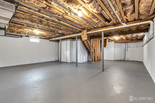 a view of a room with wooden walls