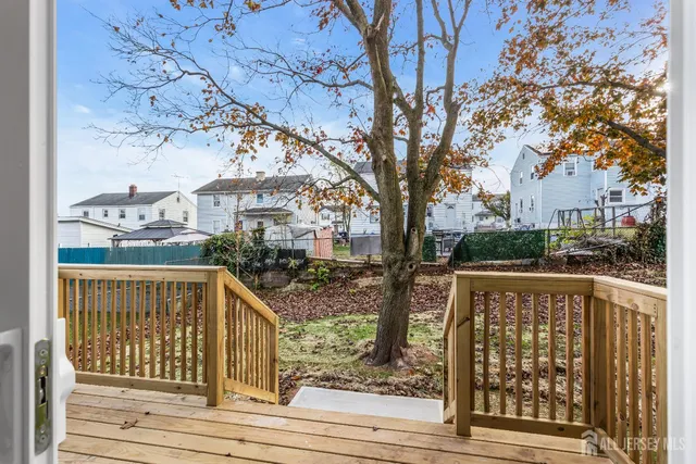 a view of street from balcony