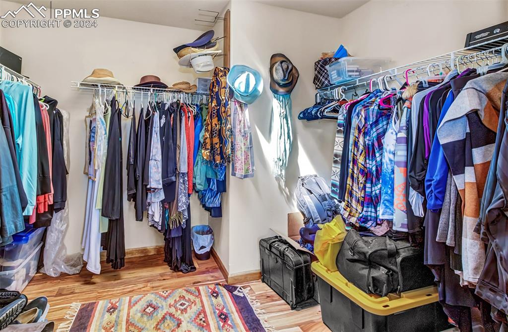747 Harding Road Rush, CO 80833 - Photo 28 of 50 a view of walk in closet with clothes