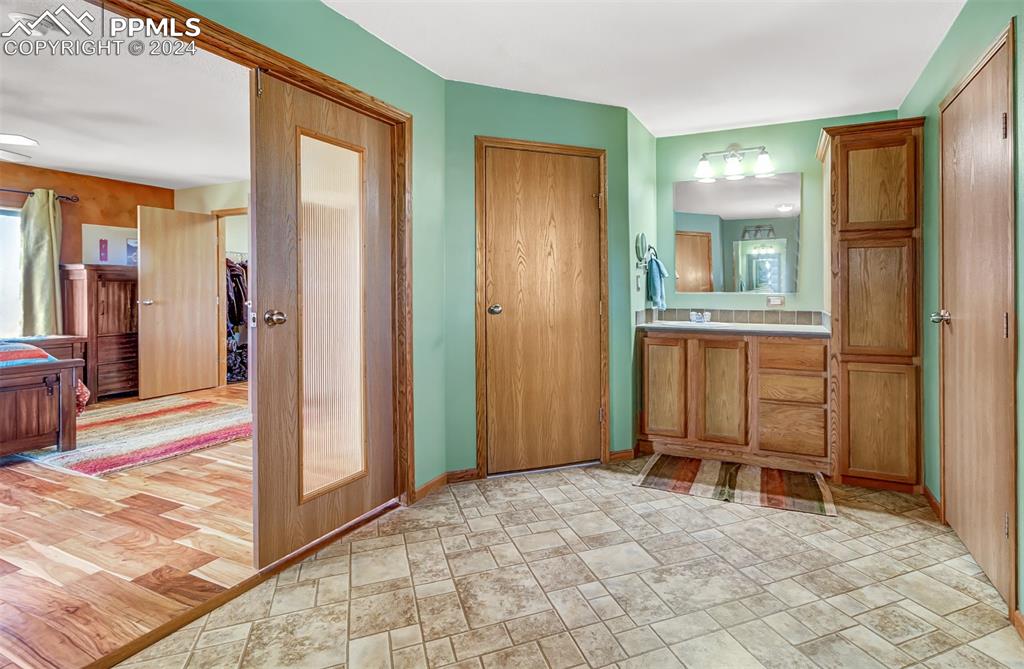 747 Harding Road Rush, CO 80833 - Photo 32 of 50 a view of a hallway with a furniture and a livingroom