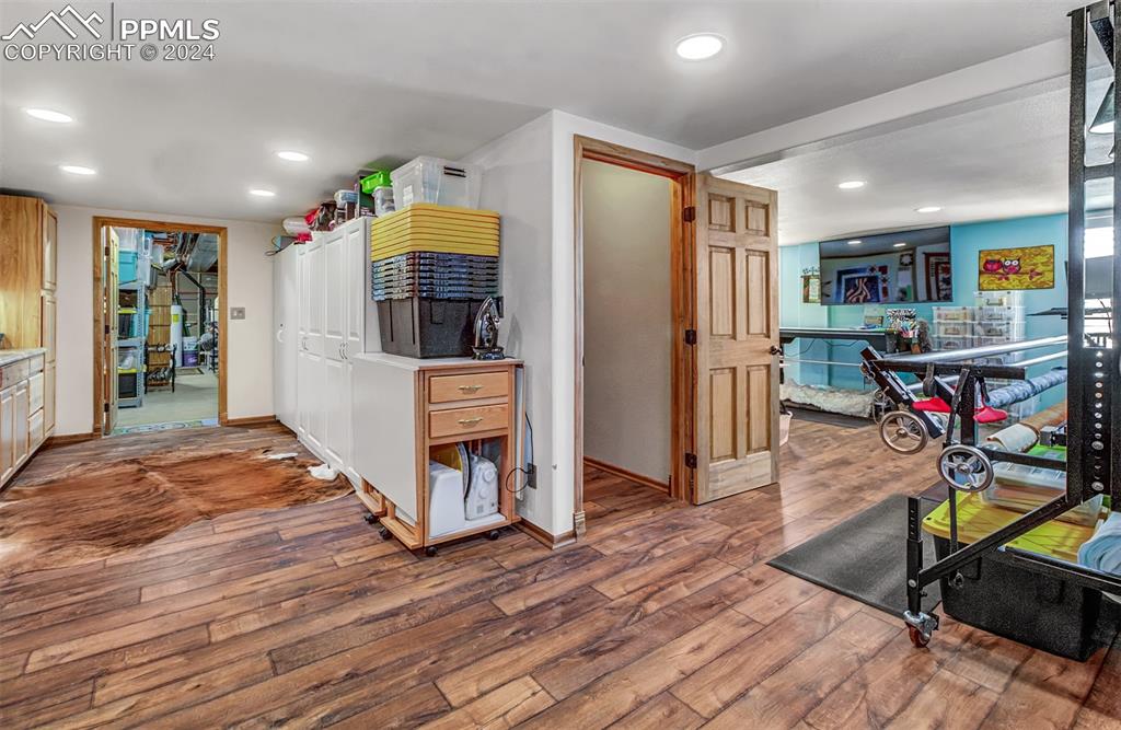 747 Harding Road Rush, CO 80833 - Photo 33 of 50 a living room with furniture and a wooden floor
