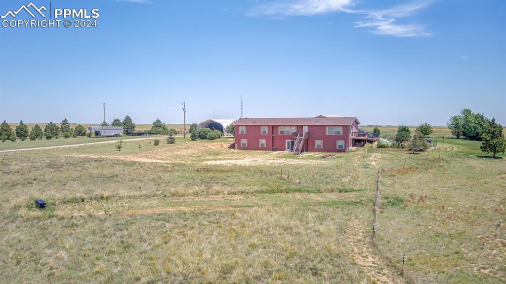 747 Harding Road Rush, CO 80833 - Photo 46 of 50 a view of a houses with a yard