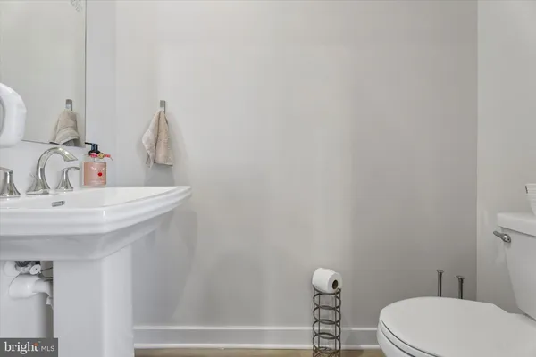 a bathroom with a sink and a toilet