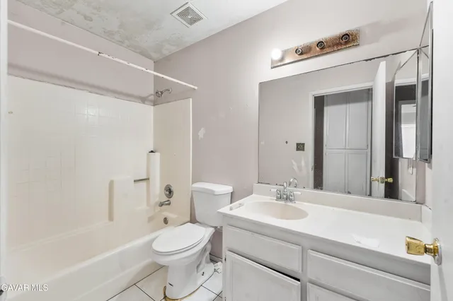 a view of a hallway with a fan