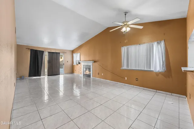 a view of an empty room and window