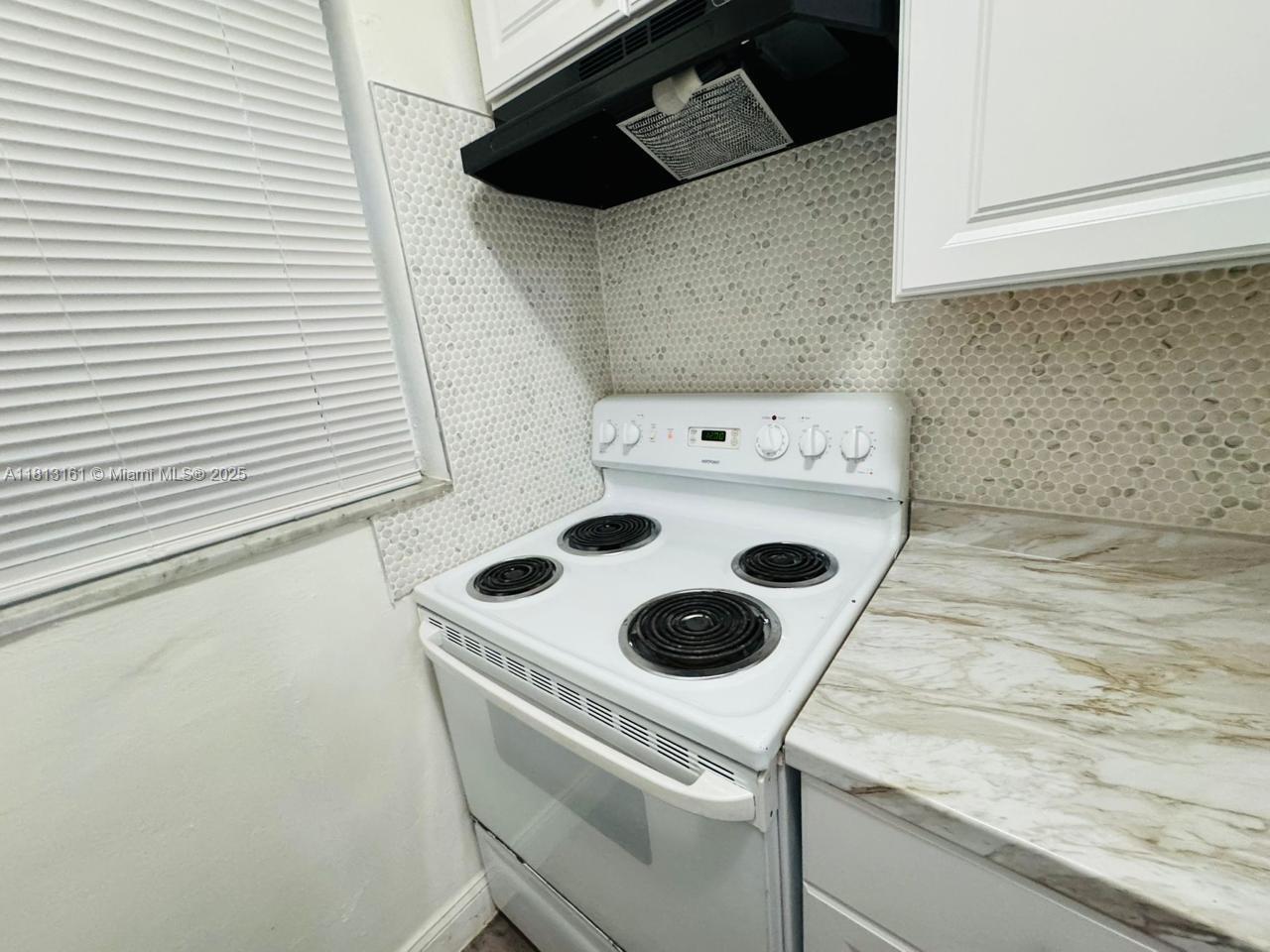 932 Northwest 5th Street, Unit 4 Miami, FL 33128 - Photo 8 of 16 a close up of a sink