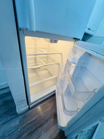 a kitchen with a stove and a microwave