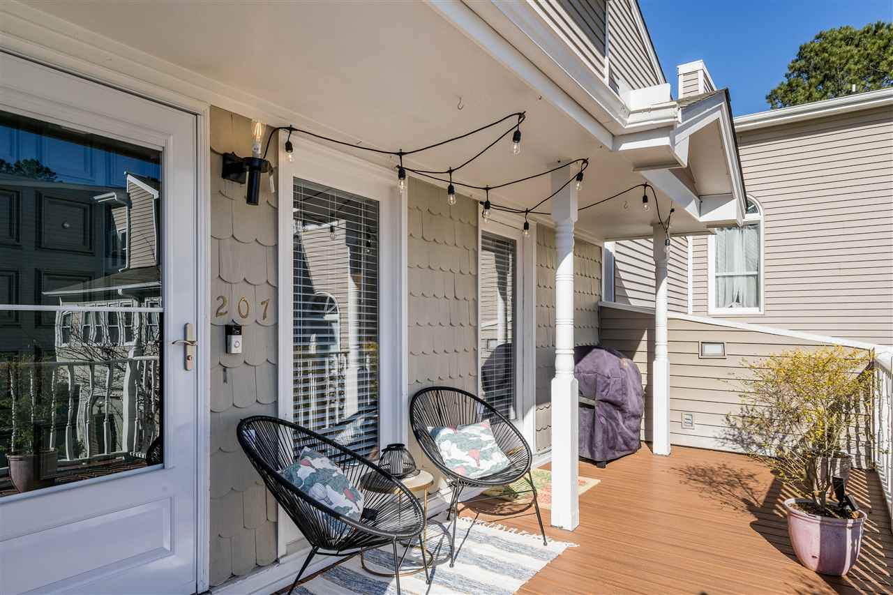 7010 Sandy Forks Road, Unit 207 Raleigh, NC 27609 - Photo 4 of 27 Don't miss out on this private condo with easy living and a community pool! Balcony