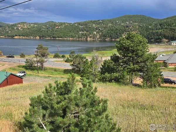 a view of lake with mountain