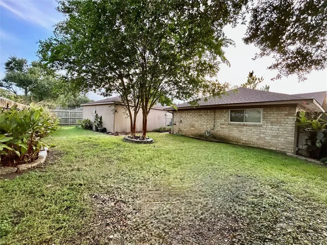 a view of a house with a garden