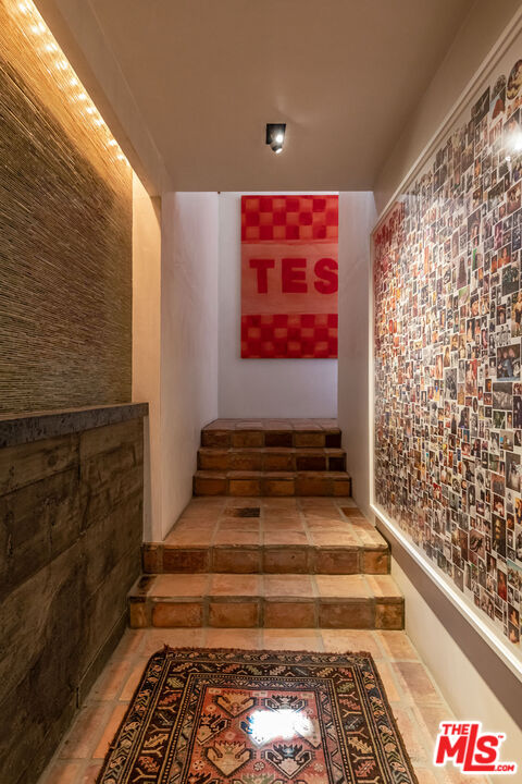 22148 Pacific Coast Highway Malibu, CA 90265 - Photo 14 of 28 a bathroom with a toilet and shower