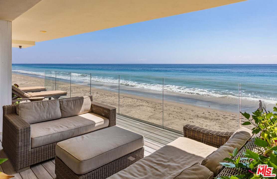 22148 Pacific Coast Highway Malibu, CA 90265 - Photo 22 of 28 a view of a terrace with furniture