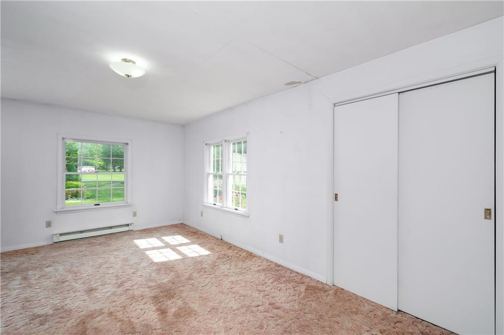19 George Jr Road Grove City, PA 16127 - Photo 31 of 42 Primary Suite with an attached full bathroom on the main level